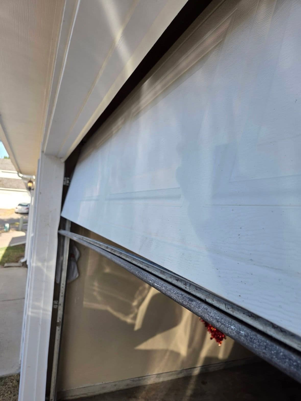 Gallery photos for Bent Bottom Rail and Off-Track Garage Door Fixed in Vineyard Utah: Image #2