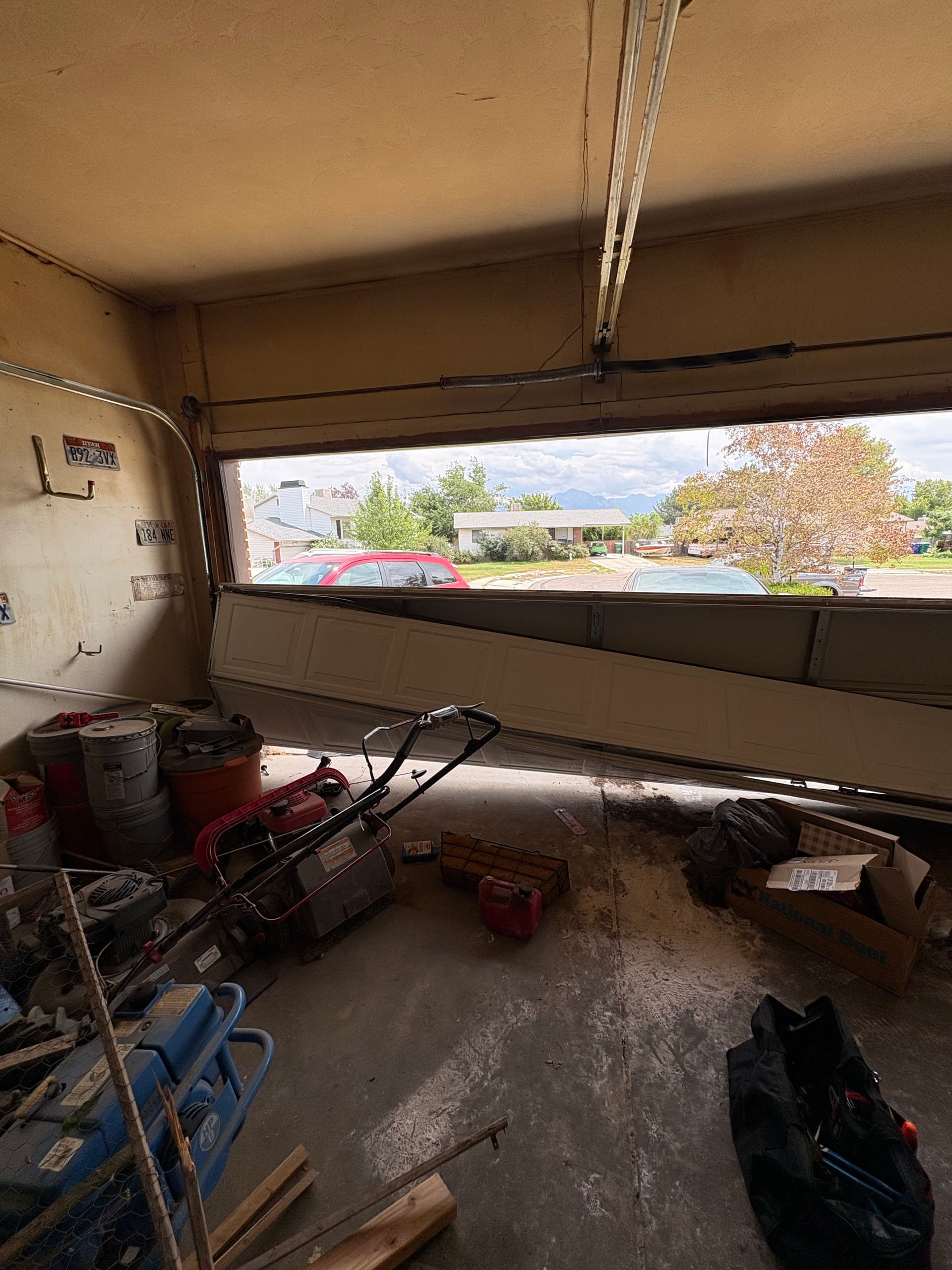 Collapsed Garage Door Back on Track and Working Again image
