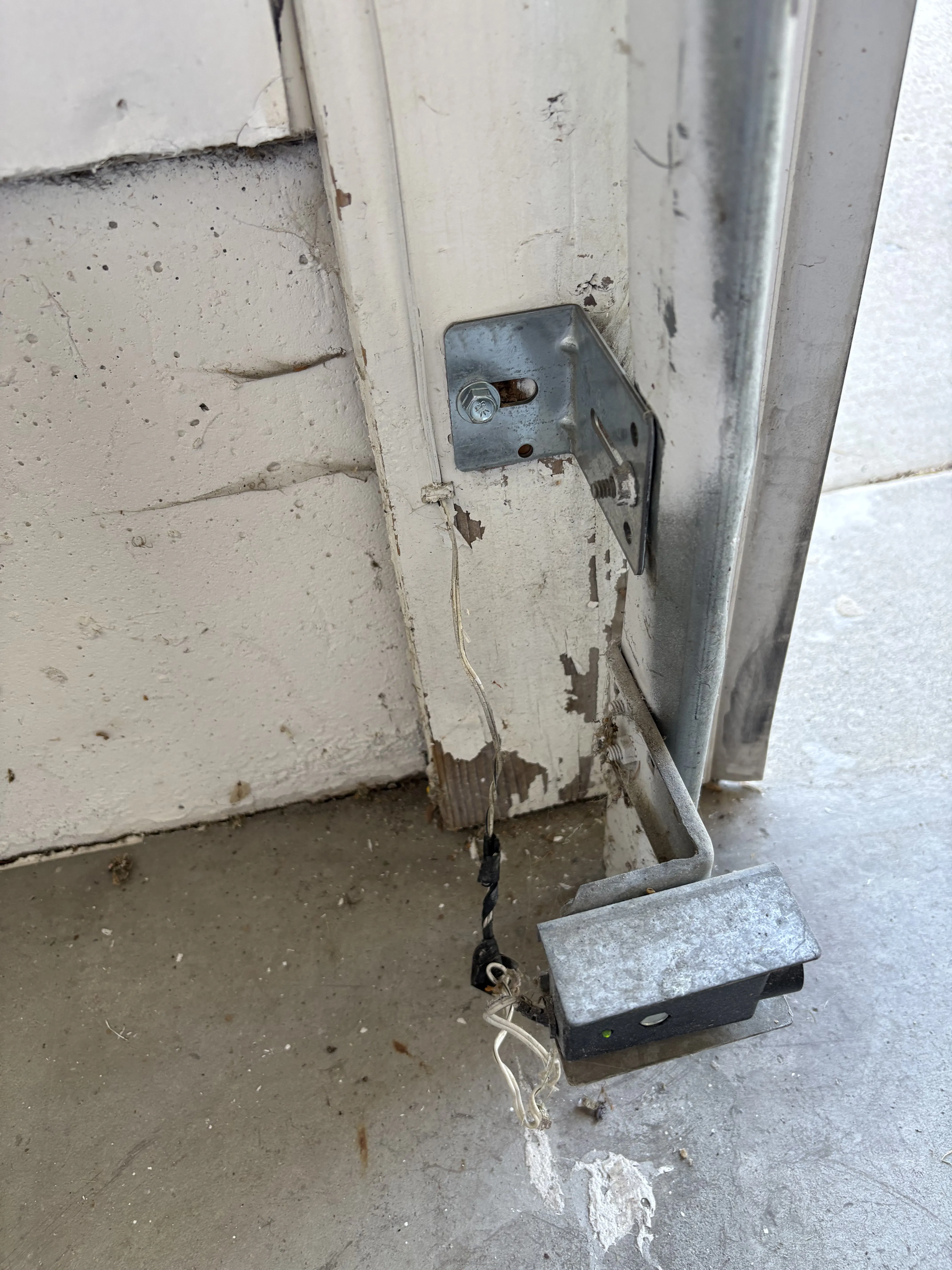 Gallery photos for Worn Bracket Replacement Keeps This Pleasant Grove Garage Door Running Right: Image #3