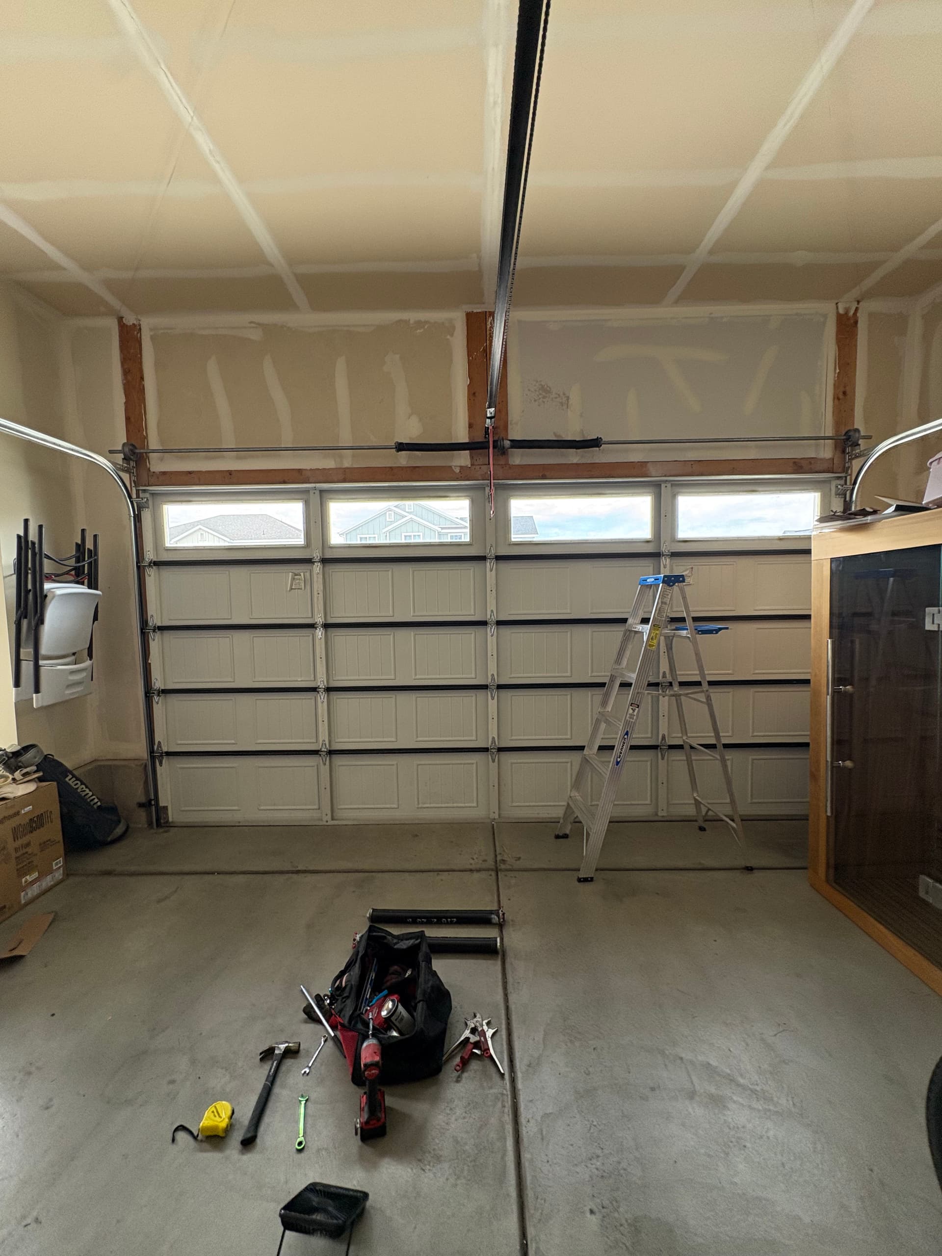 Broken Garage Door Spring Repair in Vineyard Utah image