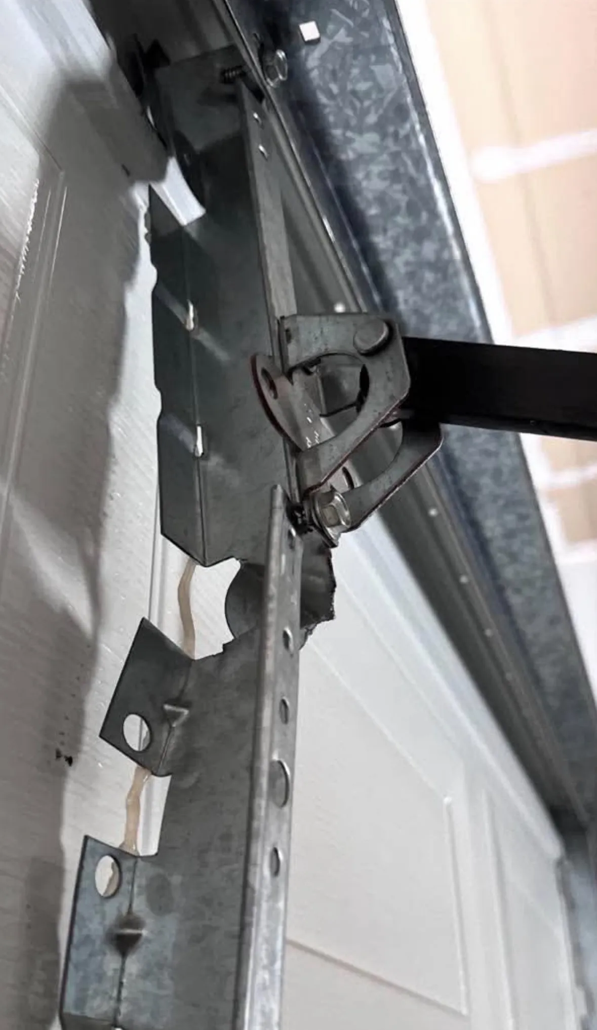 Broken Garage Door Bracket Repair in Salt Lake City image