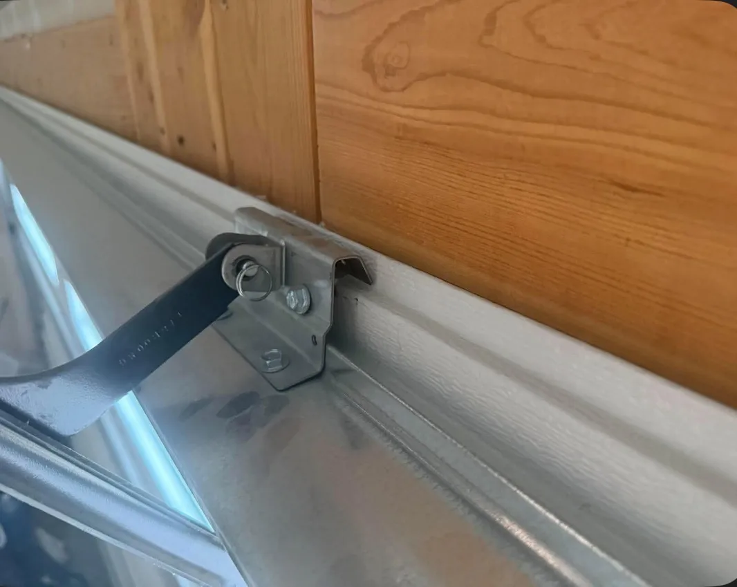 Small Garage Door Hardware Issues That Turn Into Big Problems image